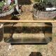Designer coffee table in brushed stainless steel and light-tinted solid oak top