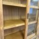 Large antique haberdashery cabinet with glass doors.