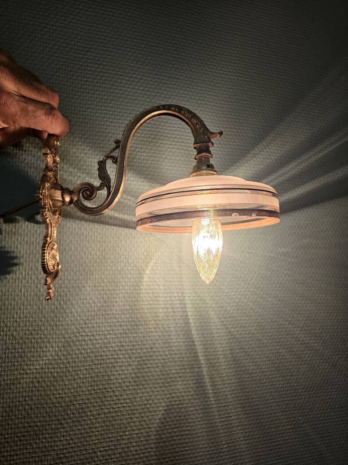 Brass wall sconces and Czechoslovak Art Deco globes
