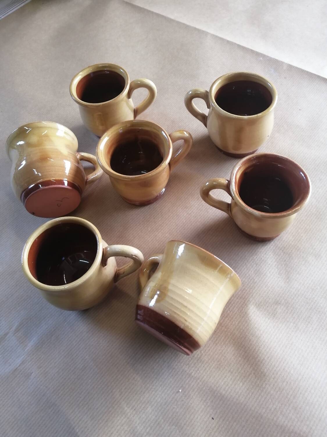 Set of 7 vintage stoneware yellow coffee cups