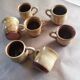 Lot de 7 tasses à café jaunes en grès vintage