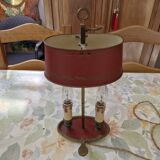 Old silver-plated bronze lamp, except for the arms which are not silver.