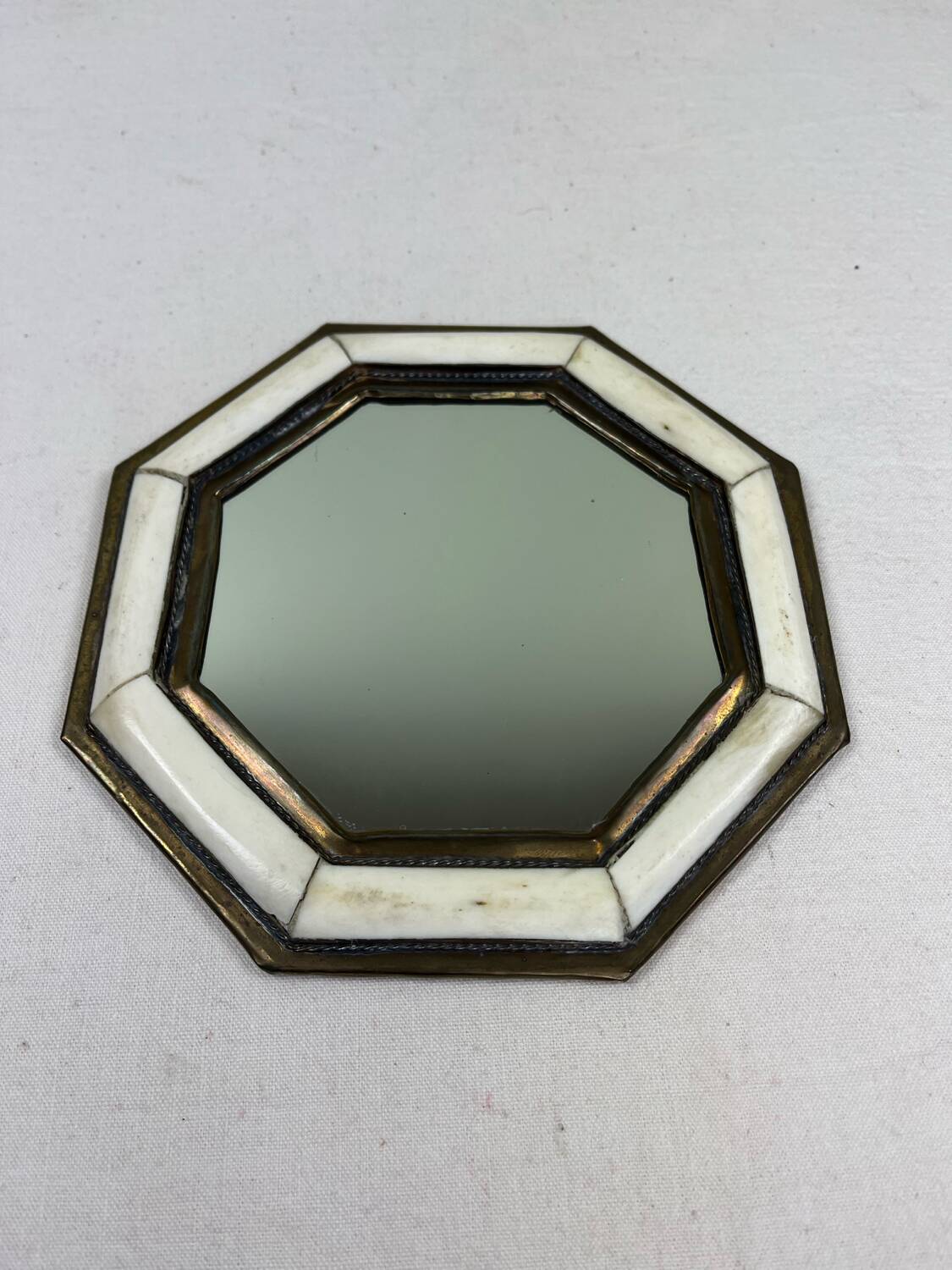 Antique brass and horn mirror