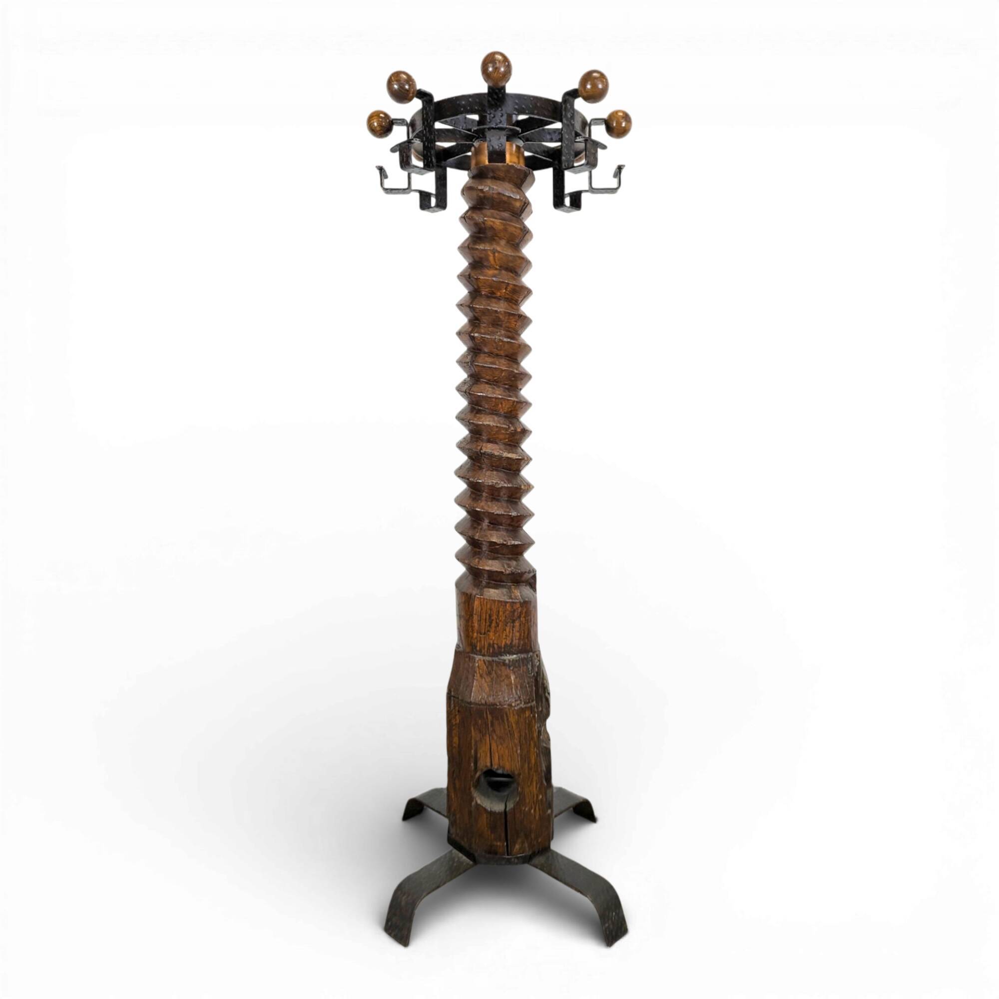 Oak and hammered iron press screw coat rack