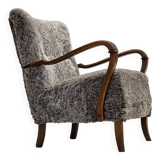 1960s, reupholstered Danish armchair, New Zealand genuine sheepskin.