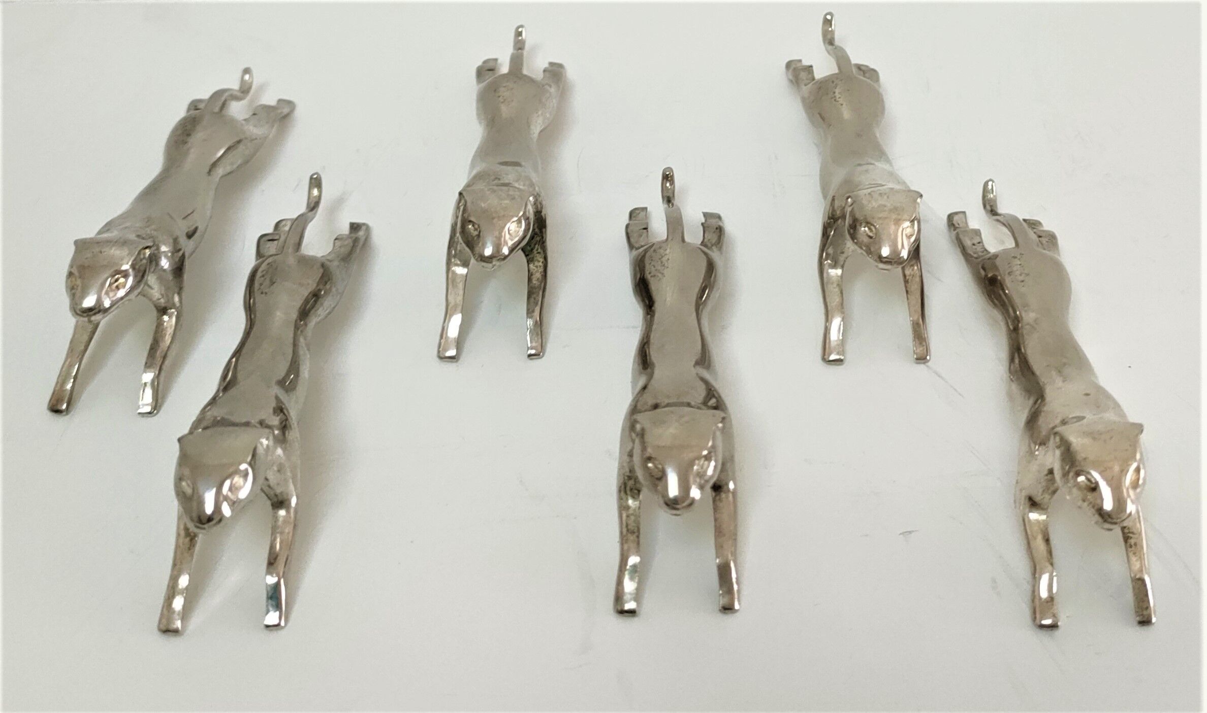 Six panther silver metal knife holders