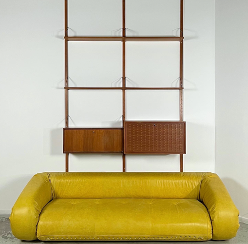 Modular wall shelf "Royal System" by Poul Cadovious for Cado Denmark, 60s.