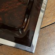 A plexiglass and silver metal tray, 1970.