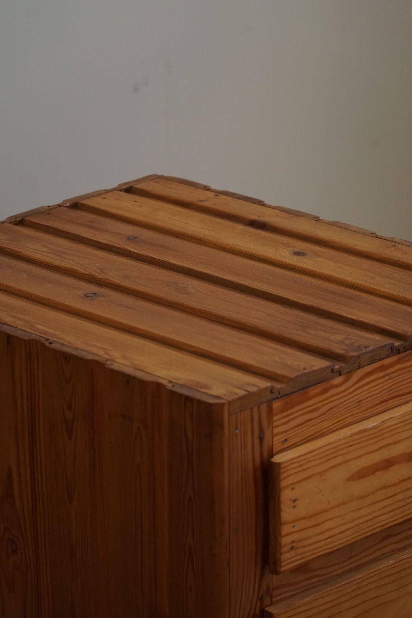 Free-standing primitive pine commode, mid-century Swedish, 1950s.
