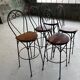 High chairs in rosewood and wrought iron