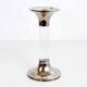 Candle holder in silver metal and lucite