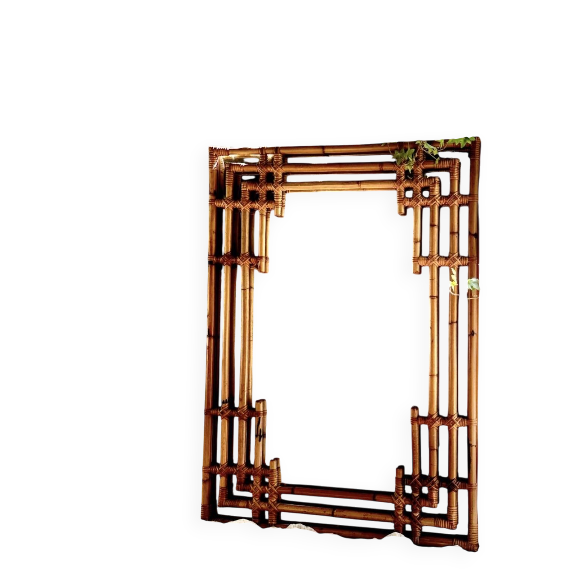 Large sculptural mirror handmade from natural bamboo and woven rattan, 1960.