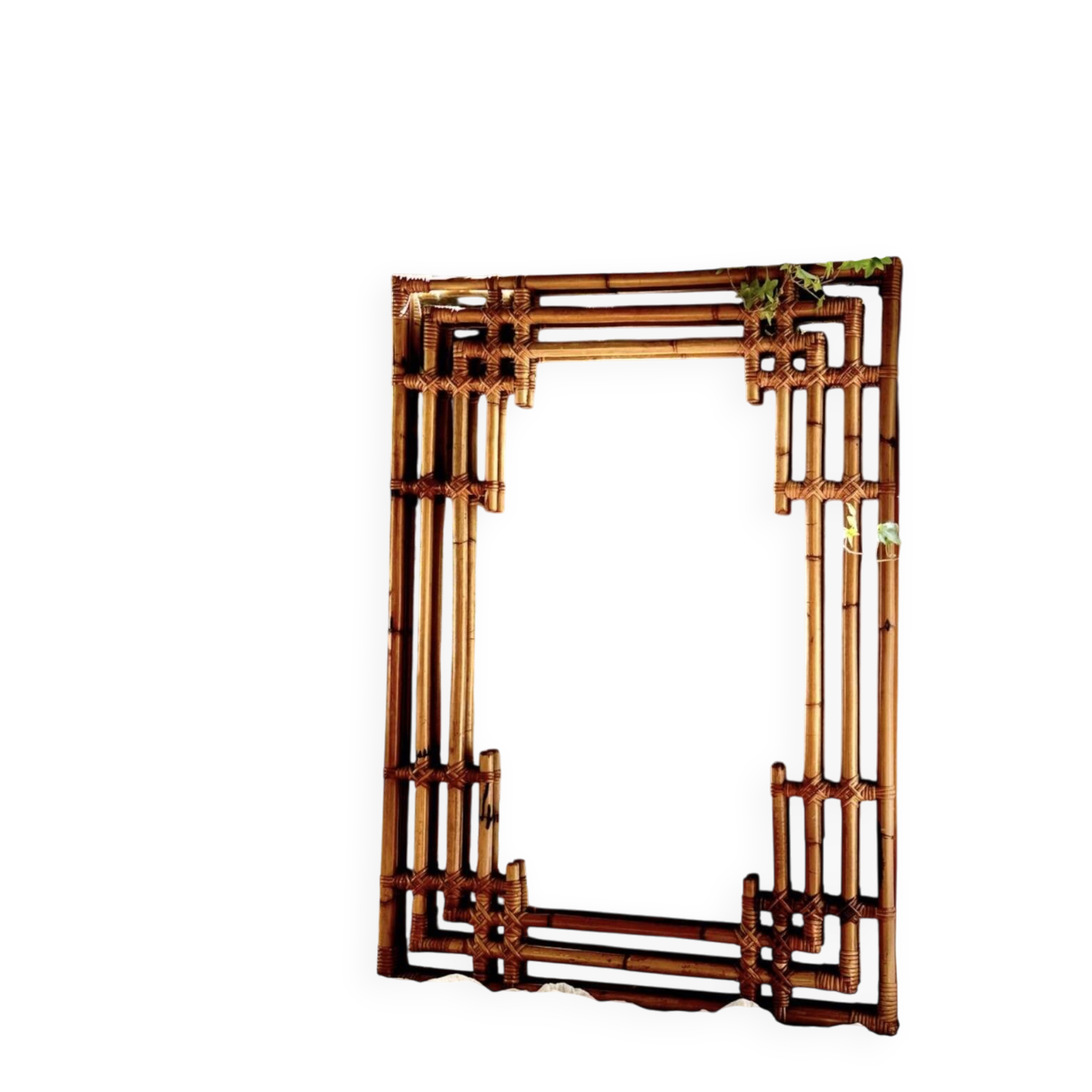 Large sculptural mirror handmade from natural bamboo and woven rattan, 1960.