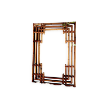 Large sculptural mirror handmade from natural bamboo and woven rattan, 1960.