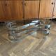 Table basse ovale design années 70 en verre et pieds chromé « S »