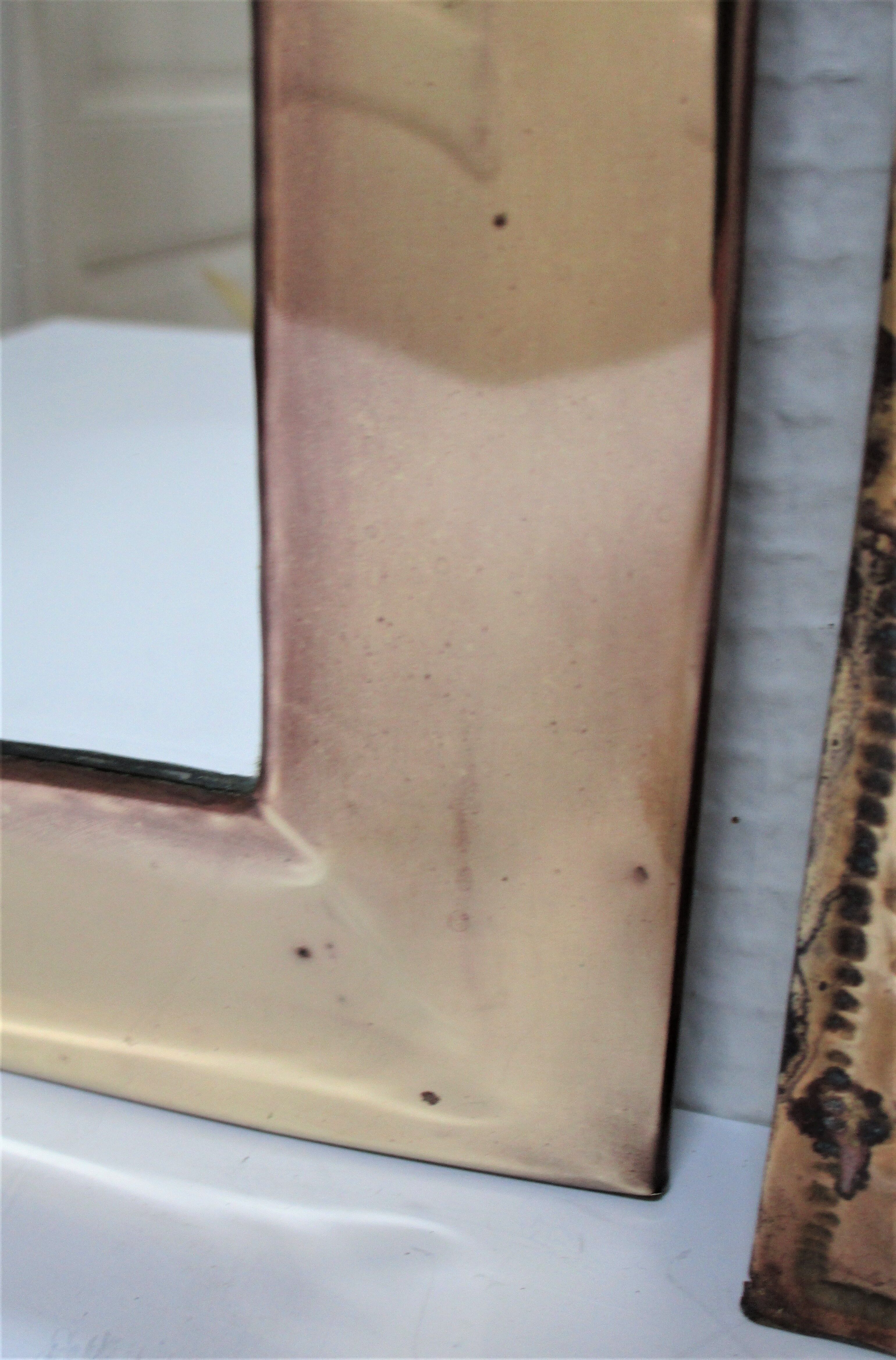Two 70s patinated brass mirrors