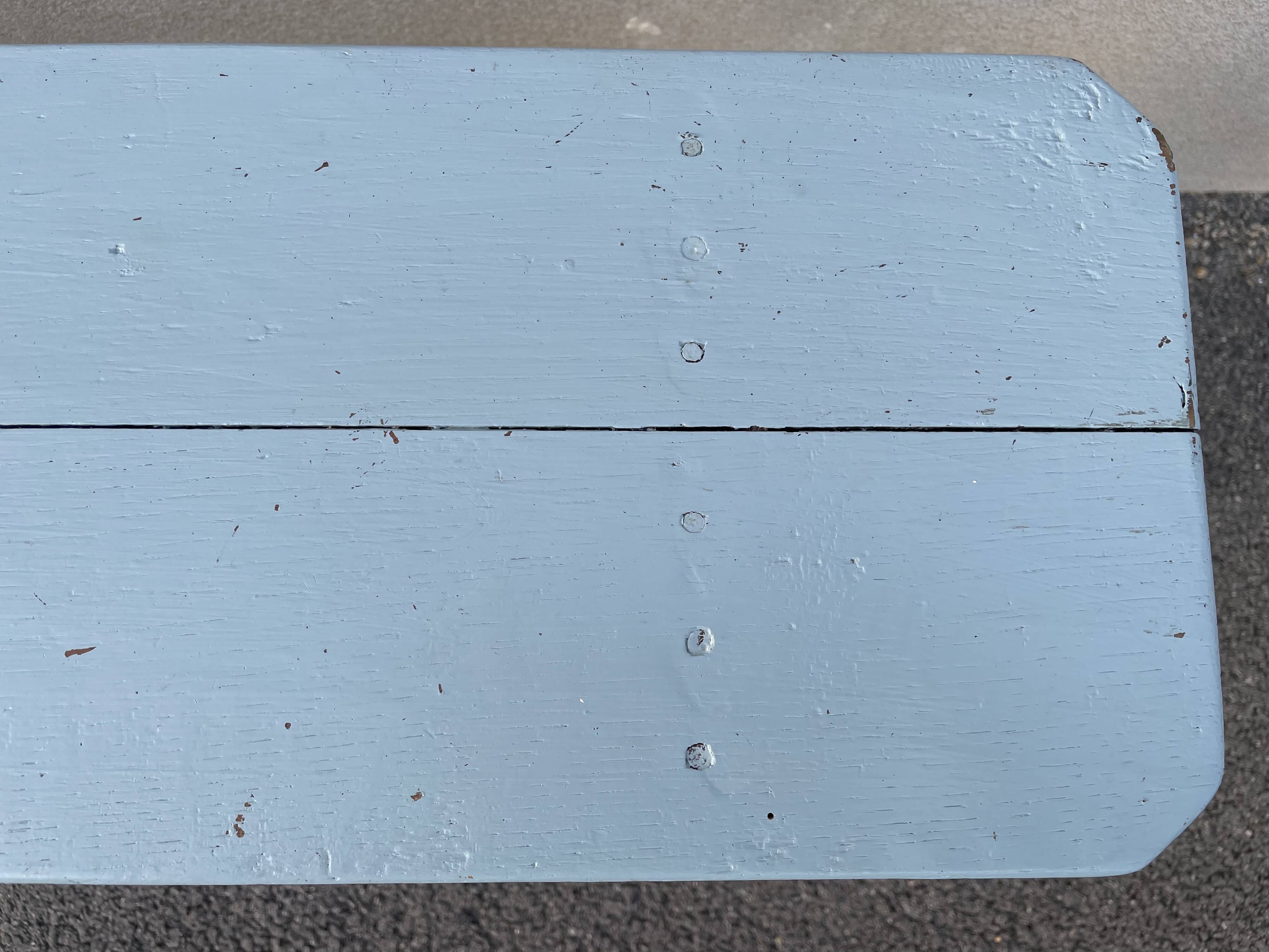 Blue painted wooden bench