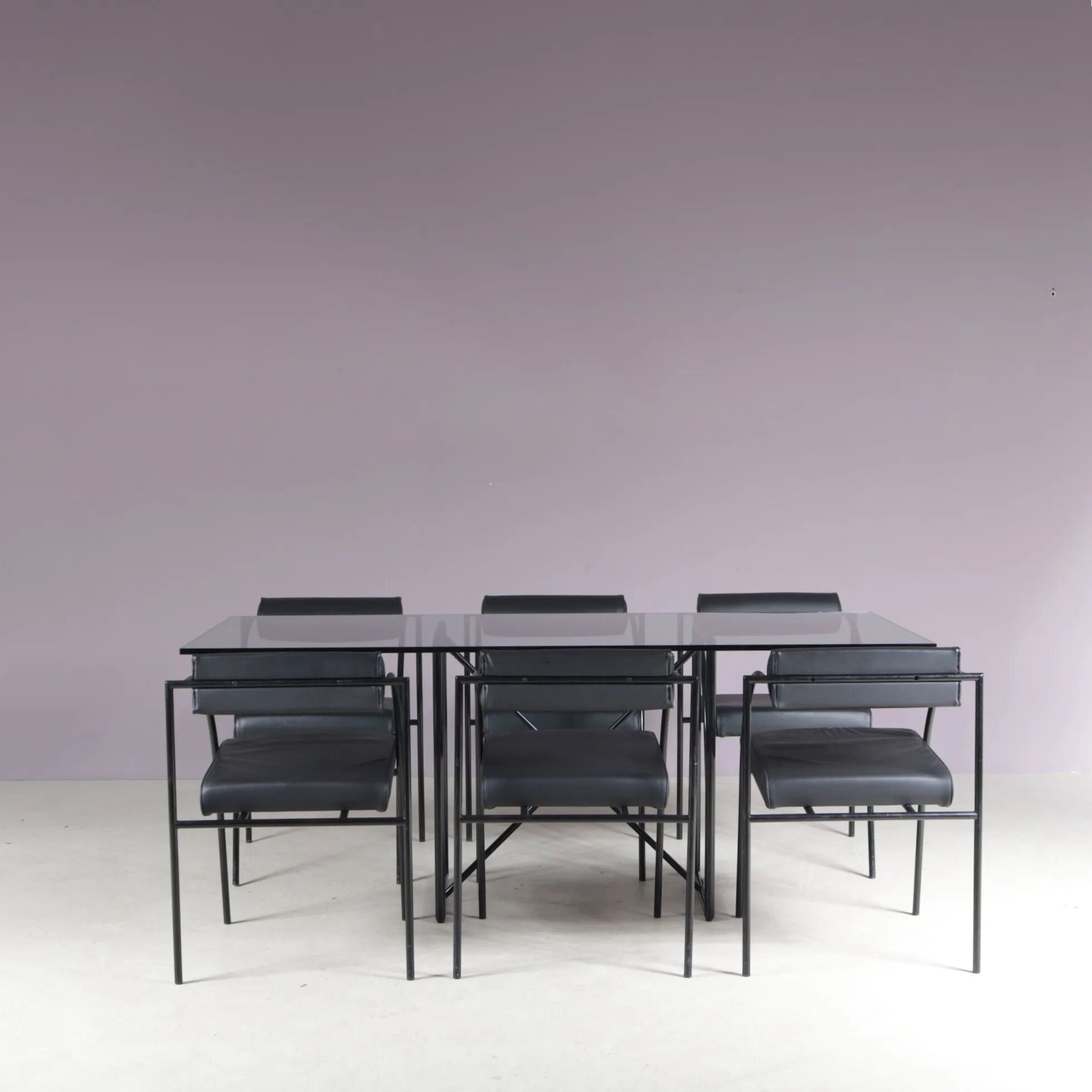 1980s “Tokio” dining table with six “Vienna” chairs by Rodney Kinsman for Bieffeplast, Italy