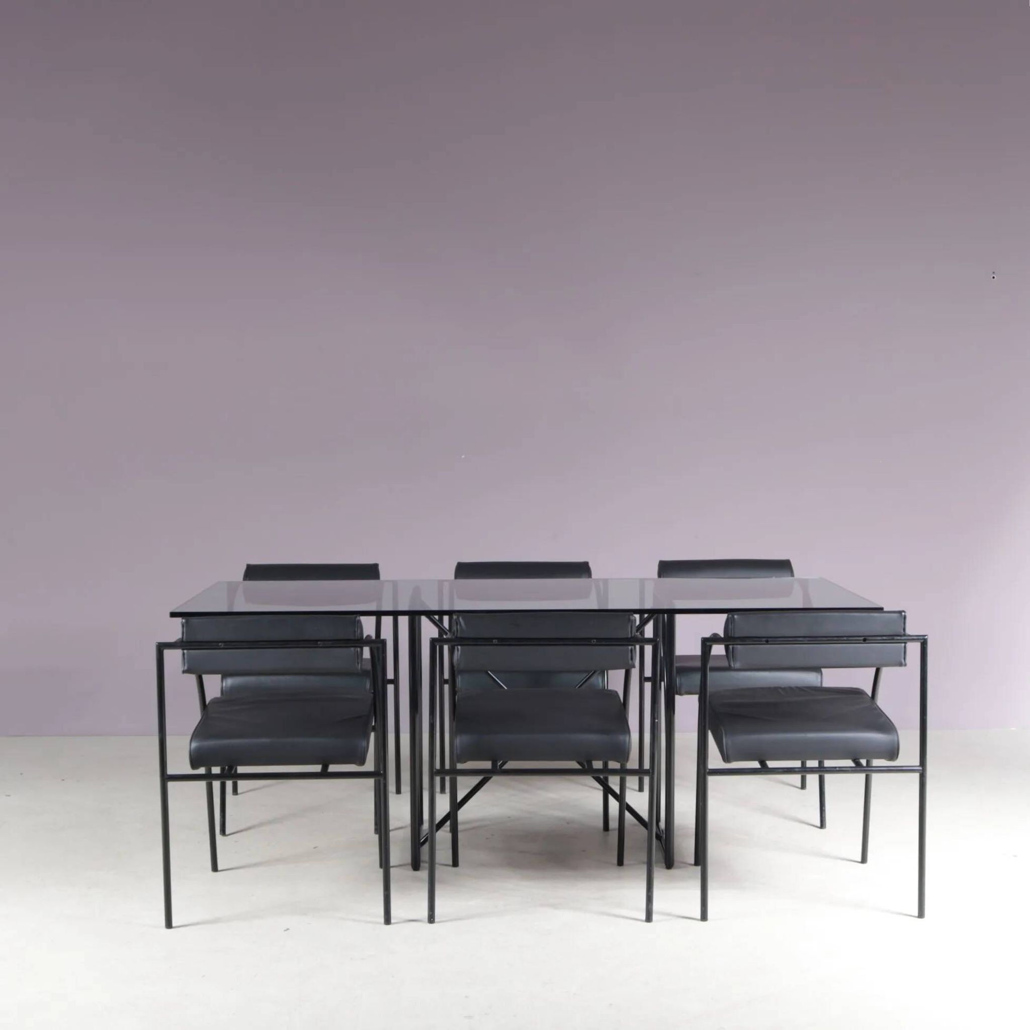 1980s “Tokio” dining table with six “Vienna” chairs by Rodney Kinsman for Bieffeplast, Italy