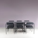 1980s “Tokio” dining table with six “Vienna” chairs by Rodney Kinsman for Bieffeplast, Italy