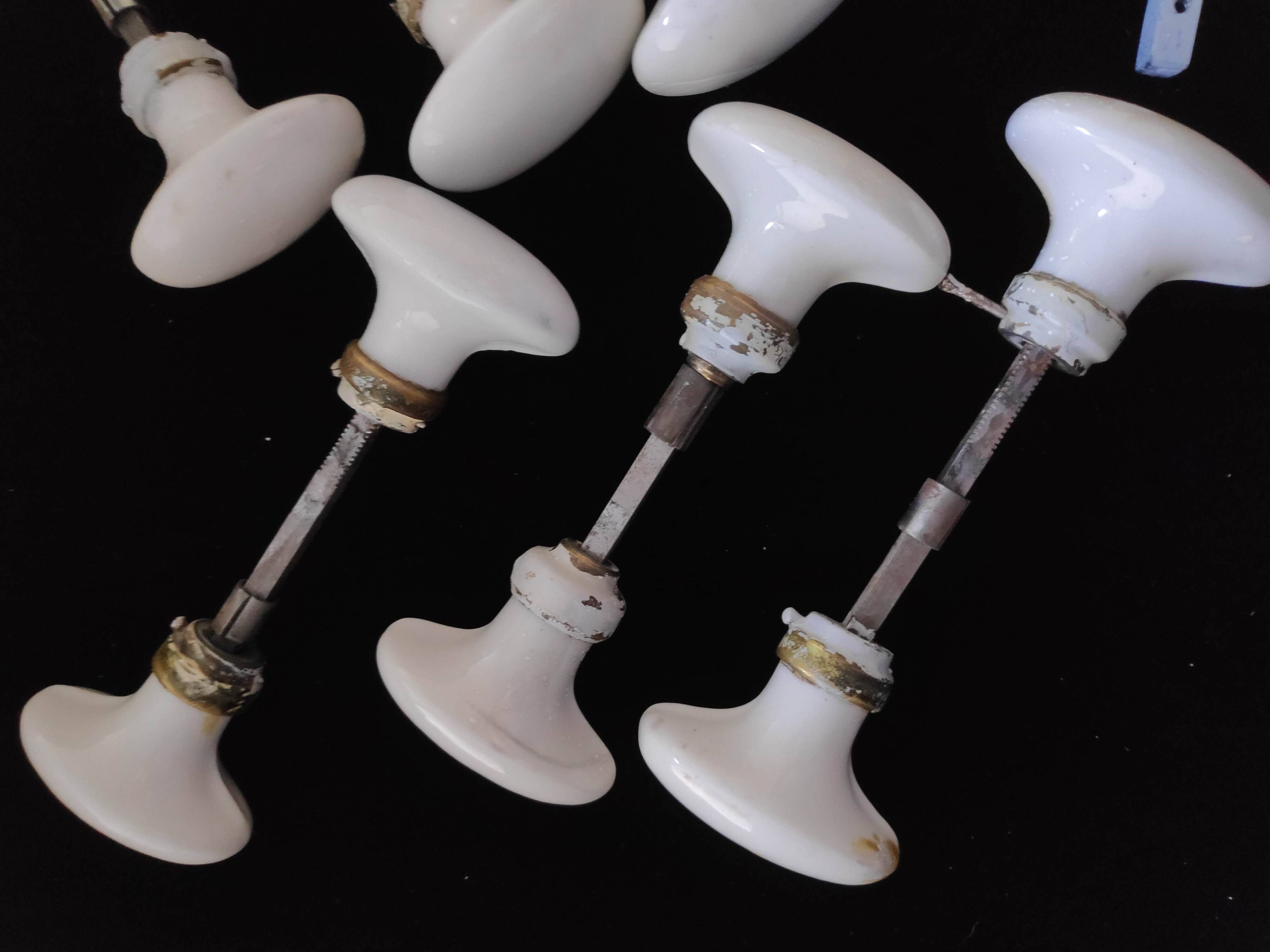 Set of 14 oval handles + 1 porcelain handle