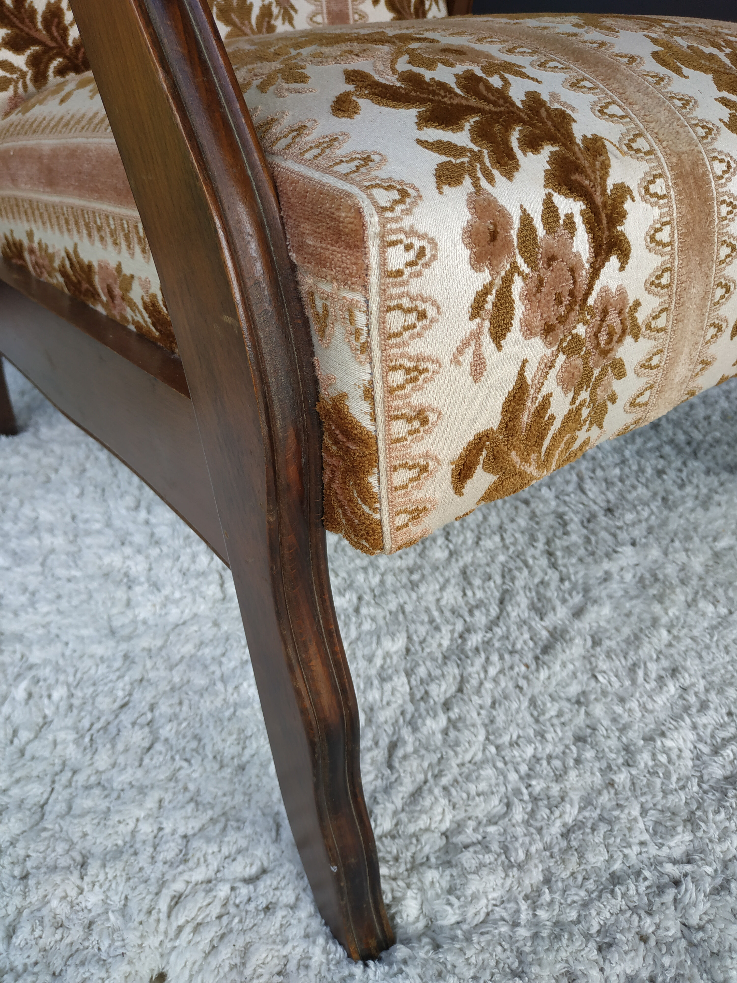 Floral-patterned velvet armchair