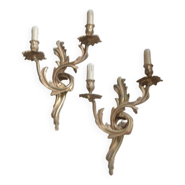 Pair of original antique bronze wall sconces.