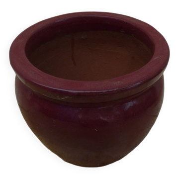 Garnet-colored terracotta flowerpot
