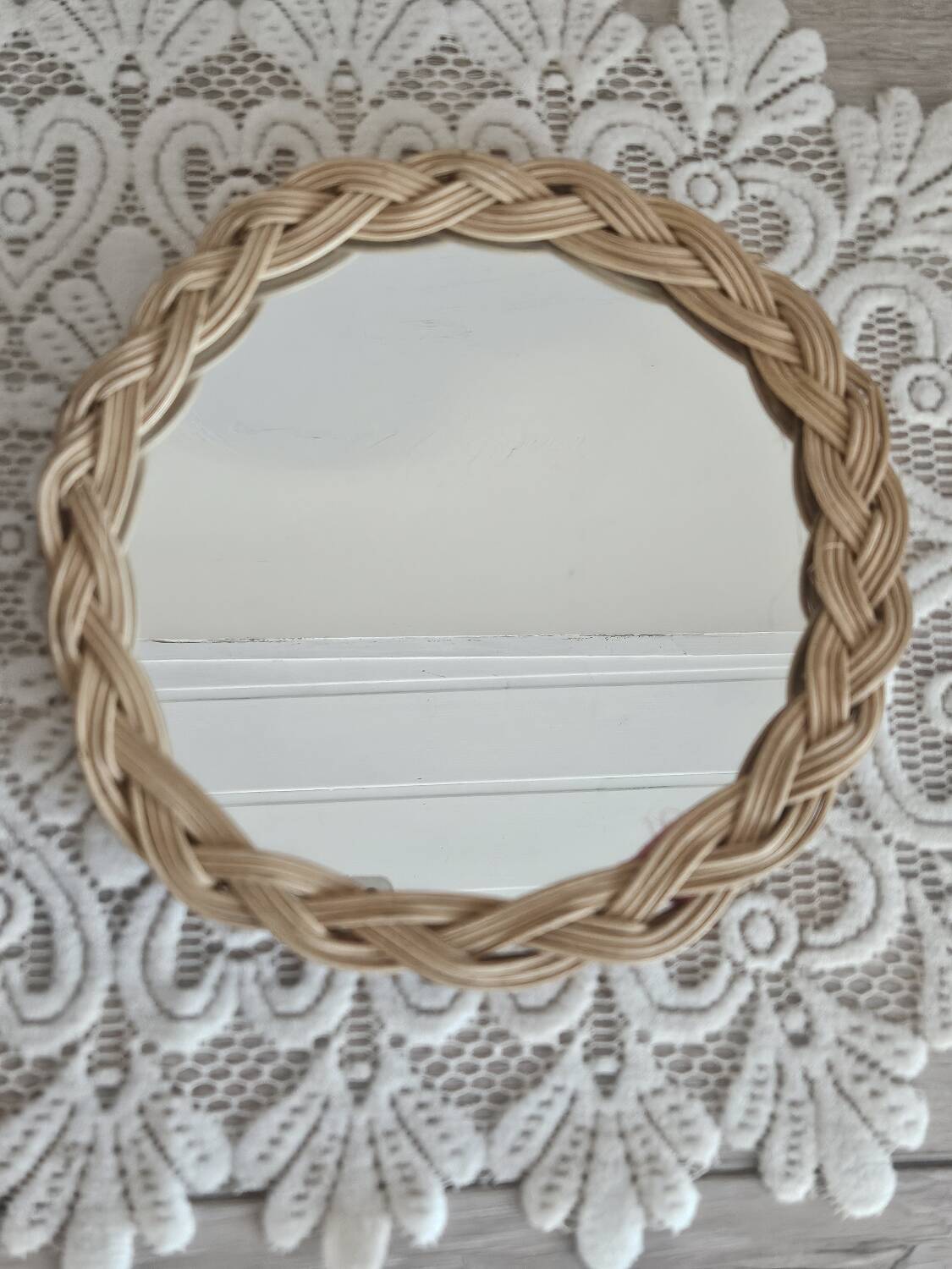 Old small round wicker mirror