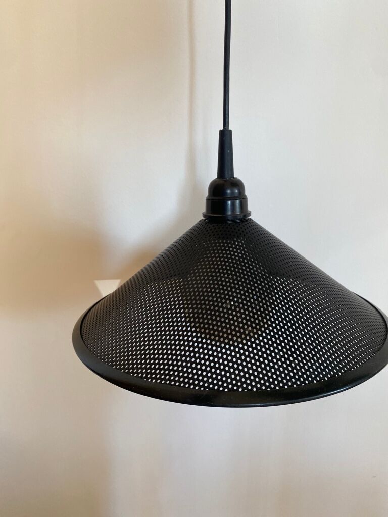 Black perforated metal suspension