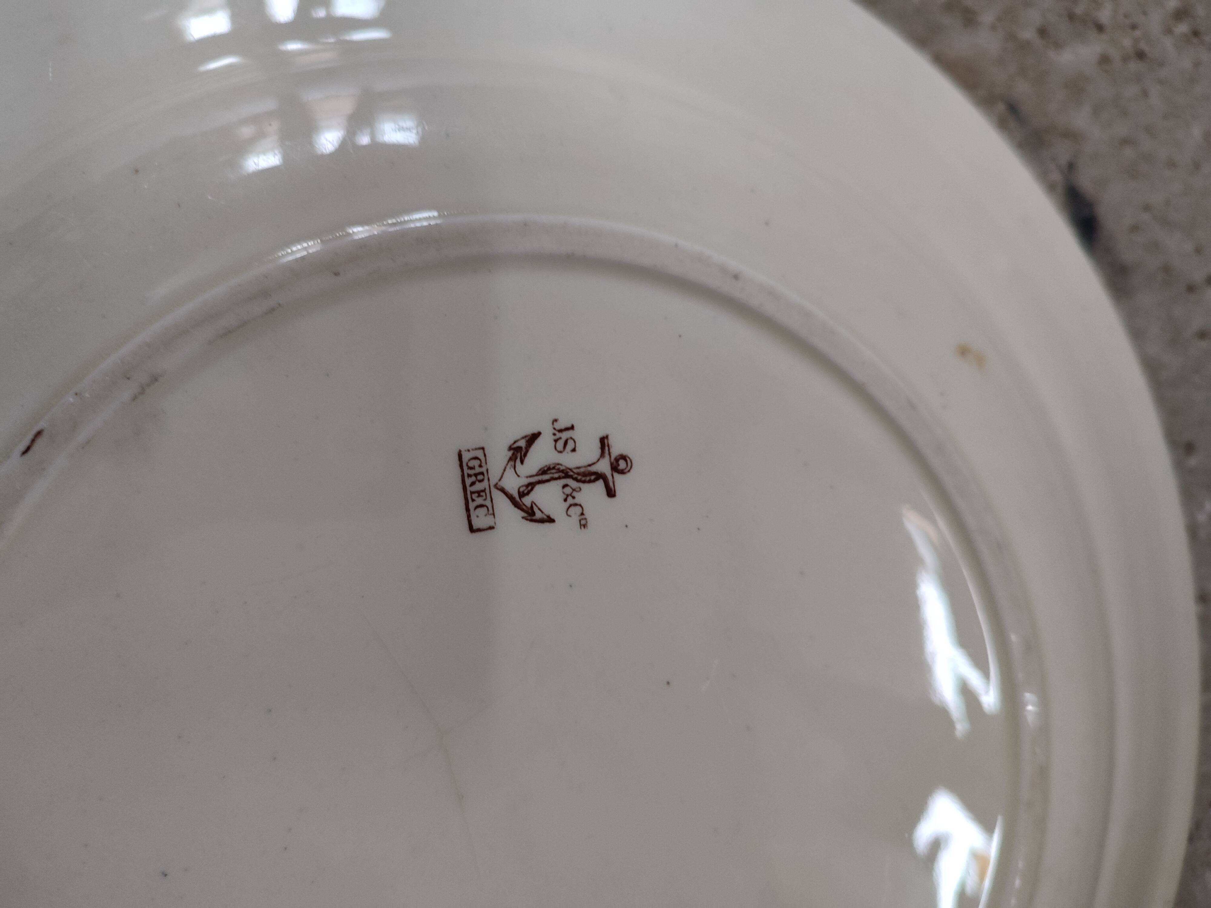 Old iron earth serving dish