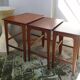 Pull-out tables from the 60s in solid exotic wood published by Younger