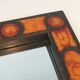 Ceramic mirror in shades of orange