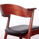 Danish armchair in teak and Skai, by Henning Kjaernulf for Korup Stolefabr.