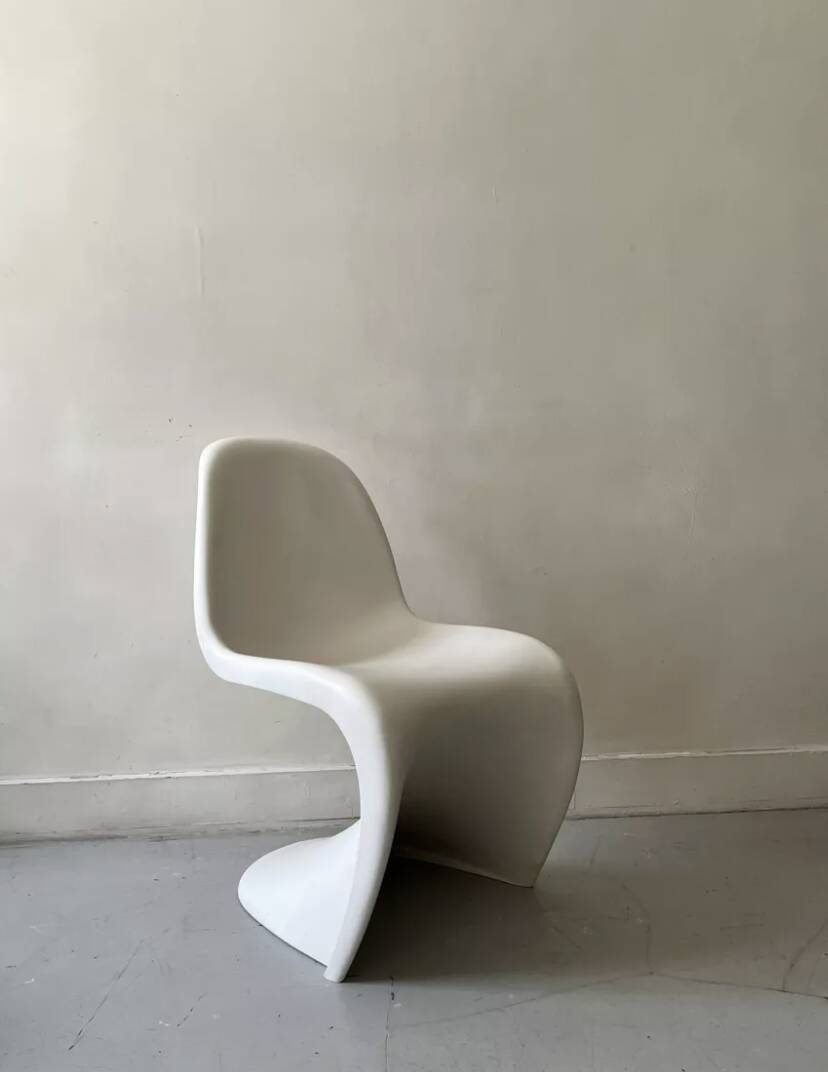 White monobloc design chair by Verner Panton, white edition Vitra.
