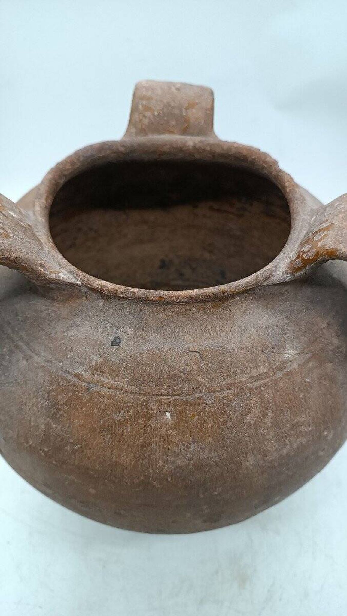 Antique terracotta jug from the 16th century