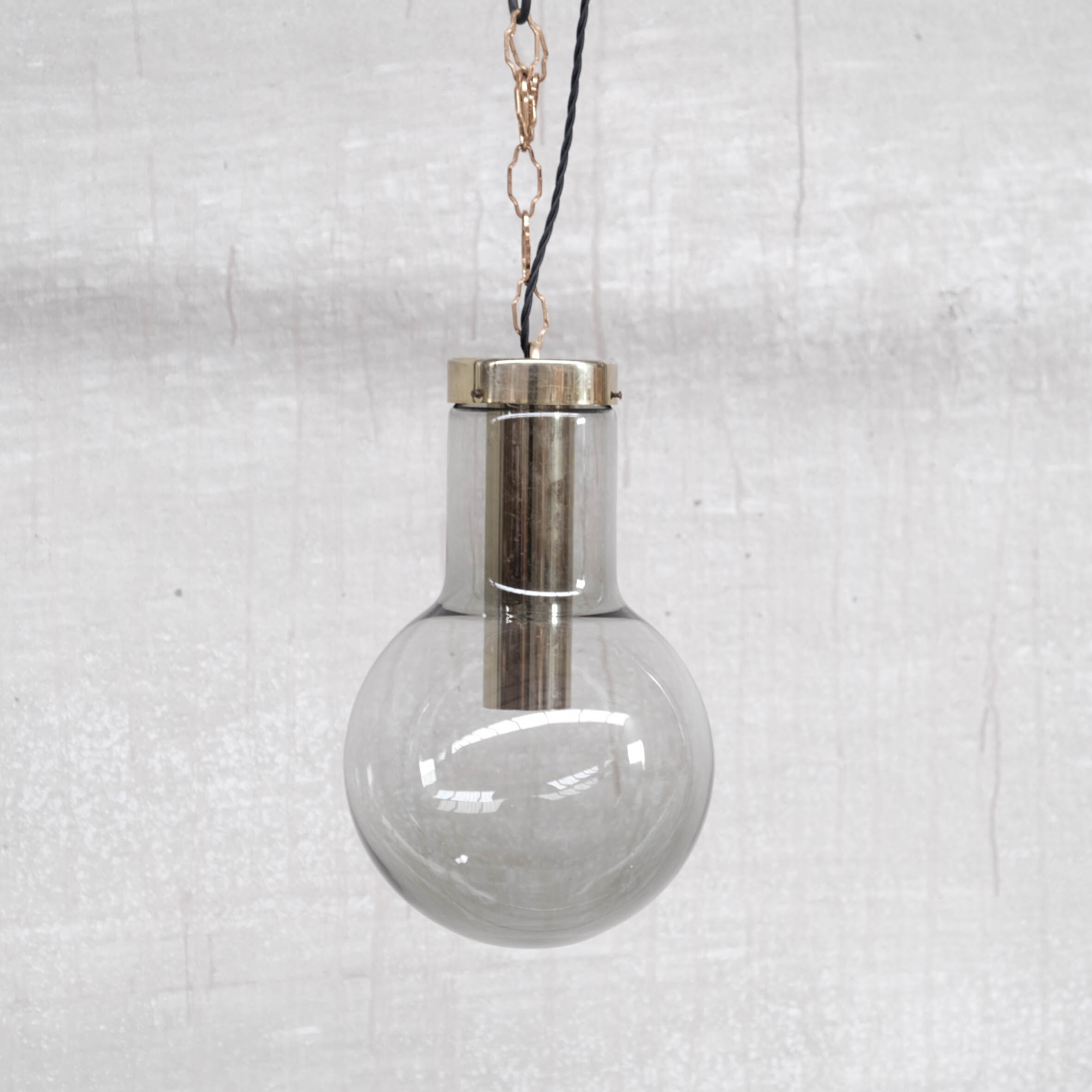 Smoked mid-century glass and brass pendant light by raak