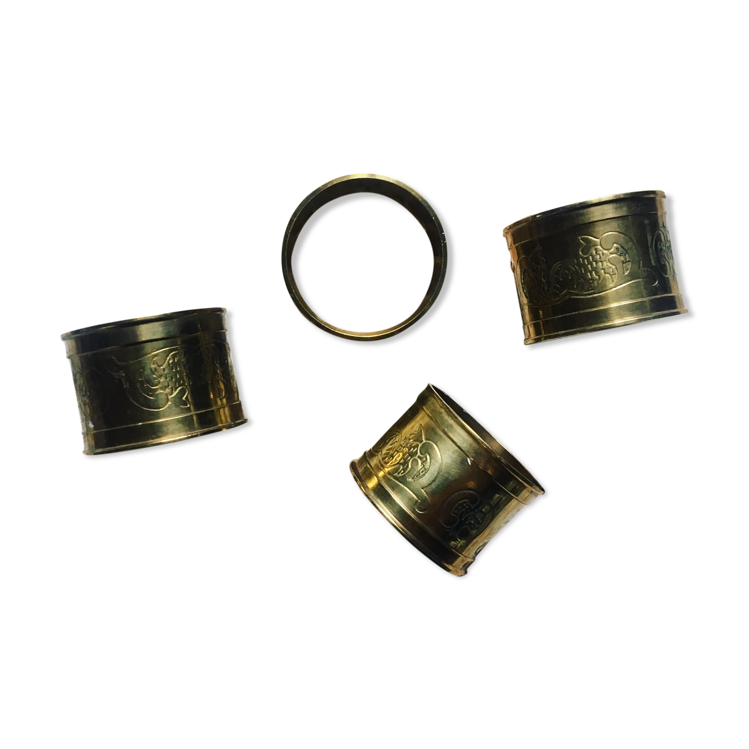 Four rounds of old brass towel around 1930