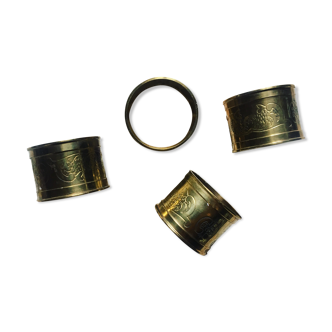 Four rounds of old brass towel around 1930