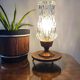 Vintage tripod table lamp from the 1960s with a glass lampshade.