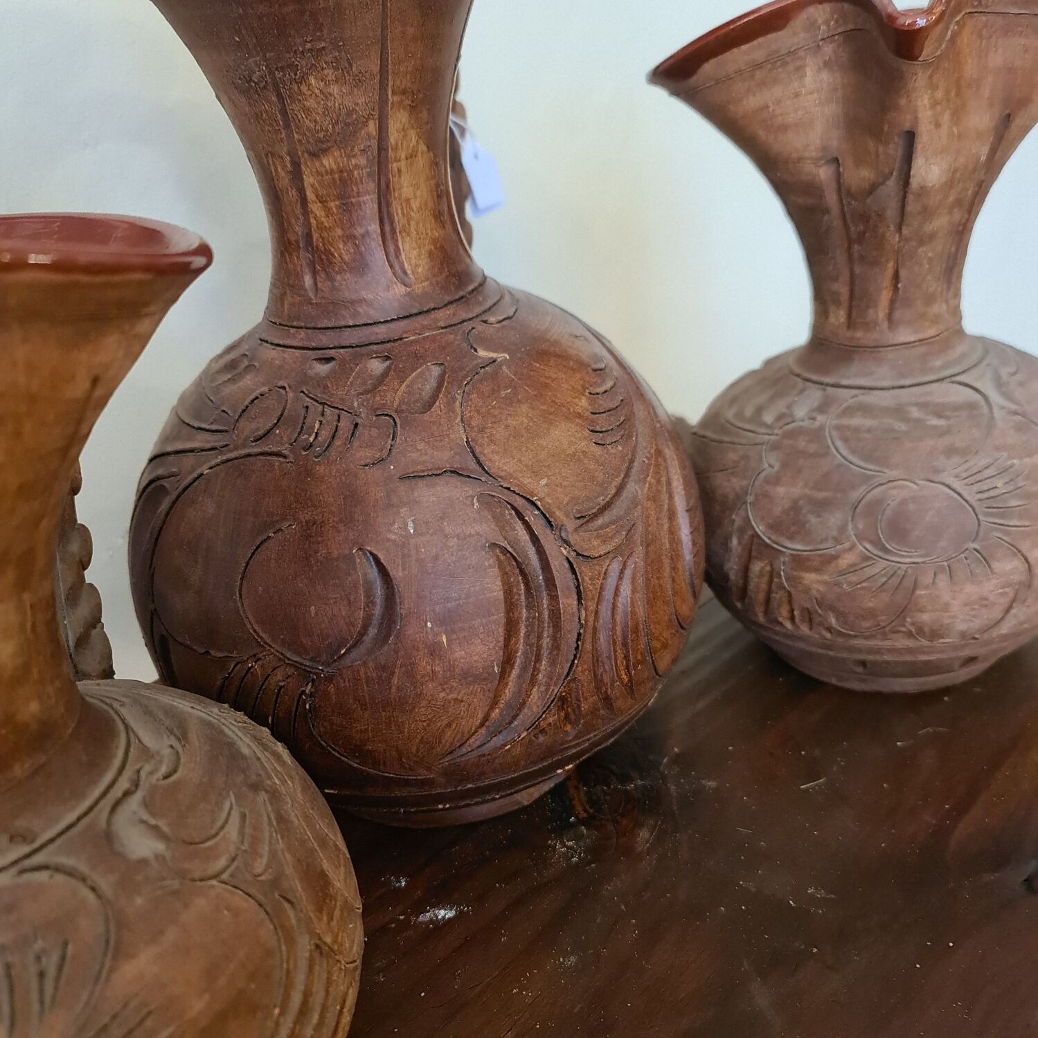 Set of carved terracotta pitchers