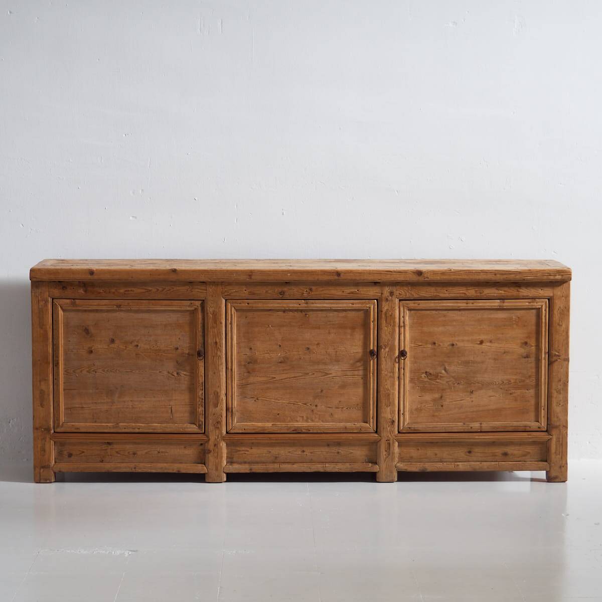 Antique wooden three-door sideboard (circa 1920)