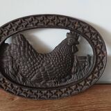 Dessous de plat en fonte