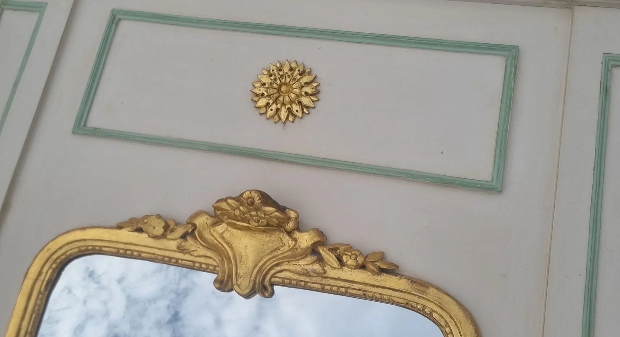 Large French mirror in architectural panel with gilt frame