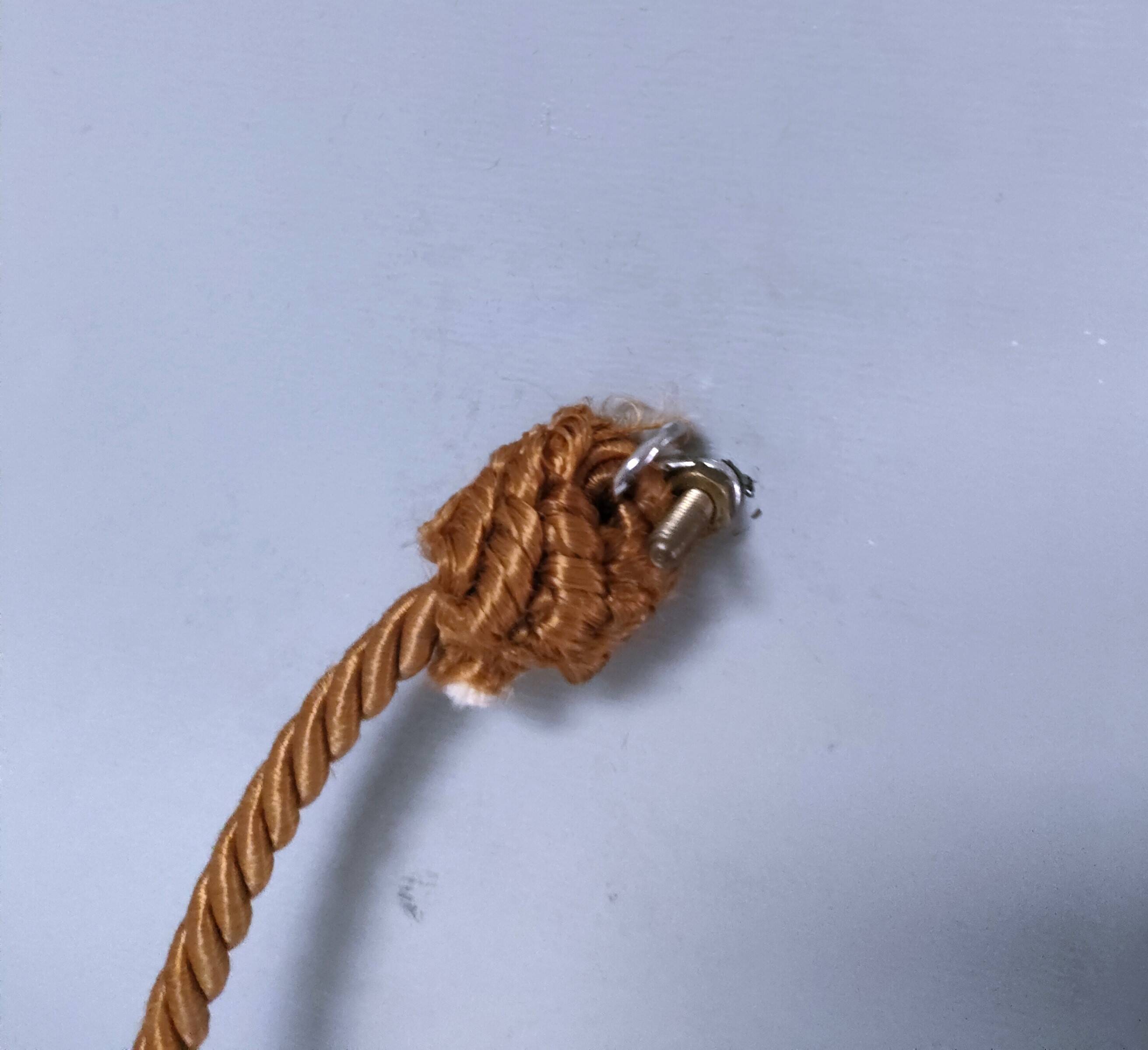 Octagonal mirror with brass hubcaps from the 60s