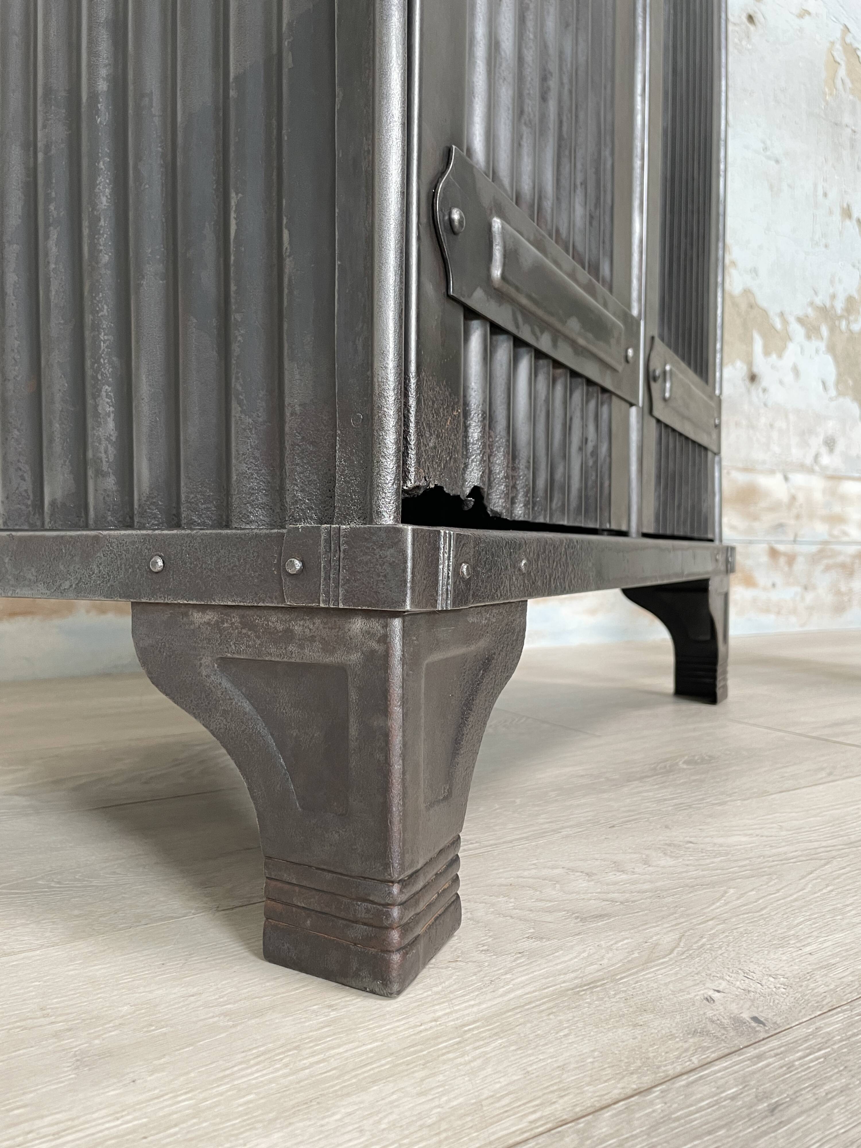 Strafor double-door corrugated iron cloakroom, circa 1920.