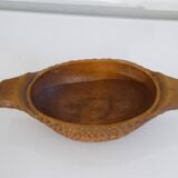 Gouged wooden pocket emptier