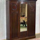 19th-century English mahogany three-door wardrobe.