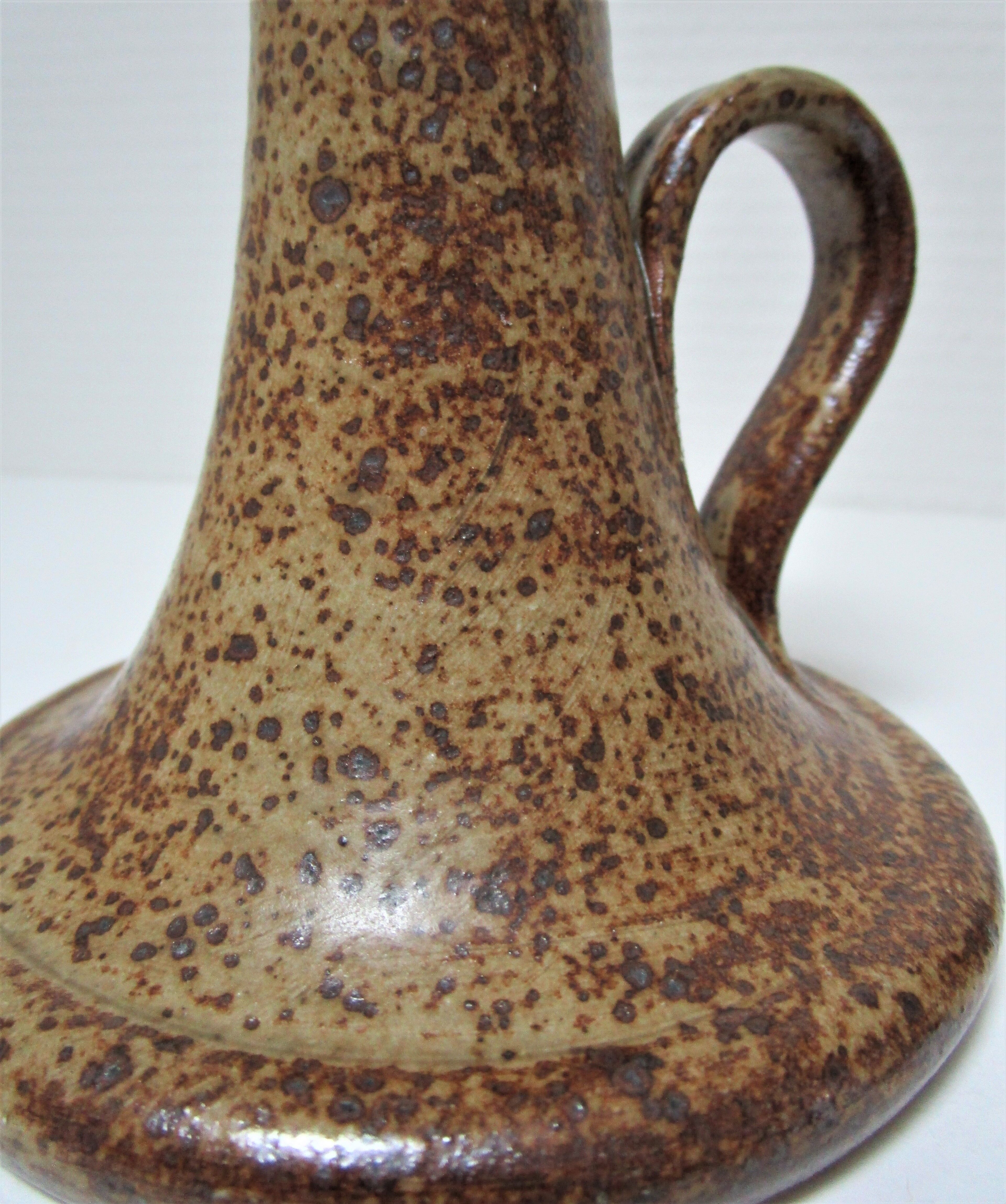 Pair of vintage sandstone candlesticks