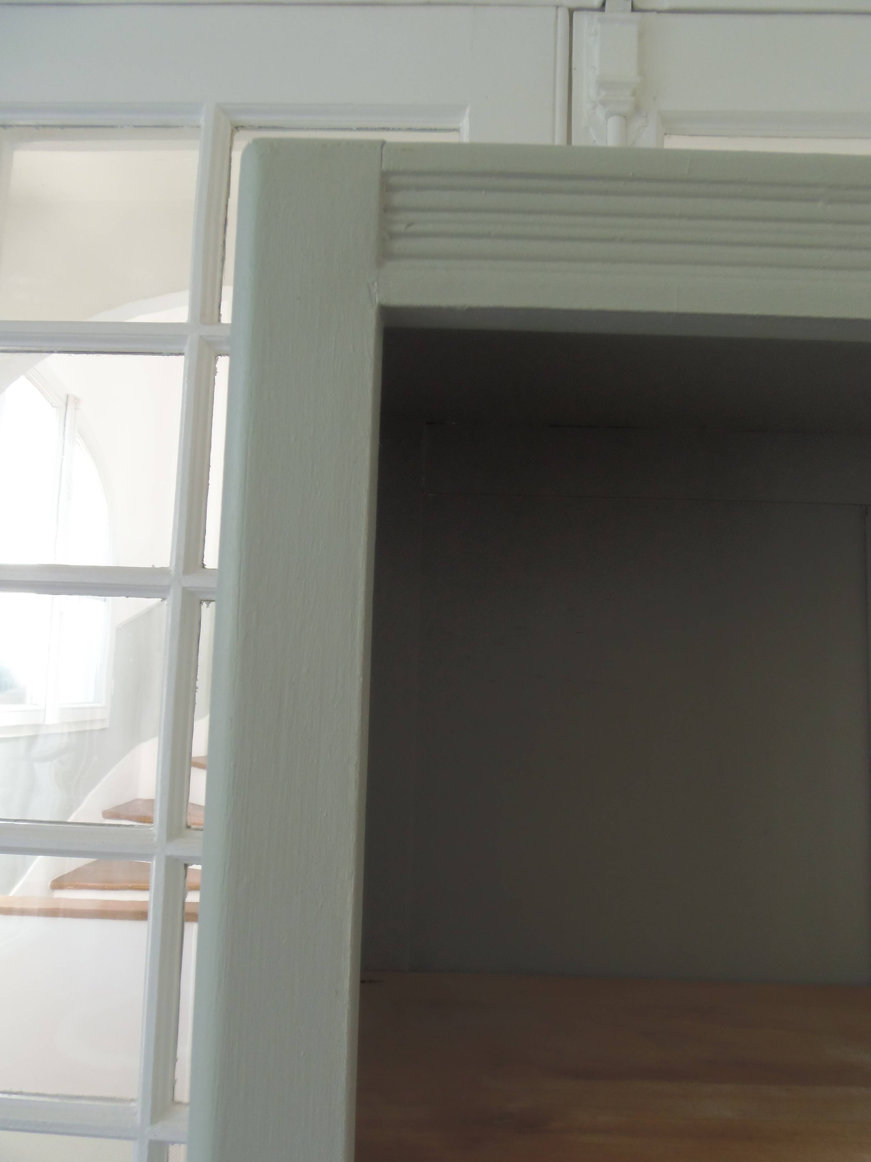 Vintage shallow bookcase re-enchanted in verdigris.